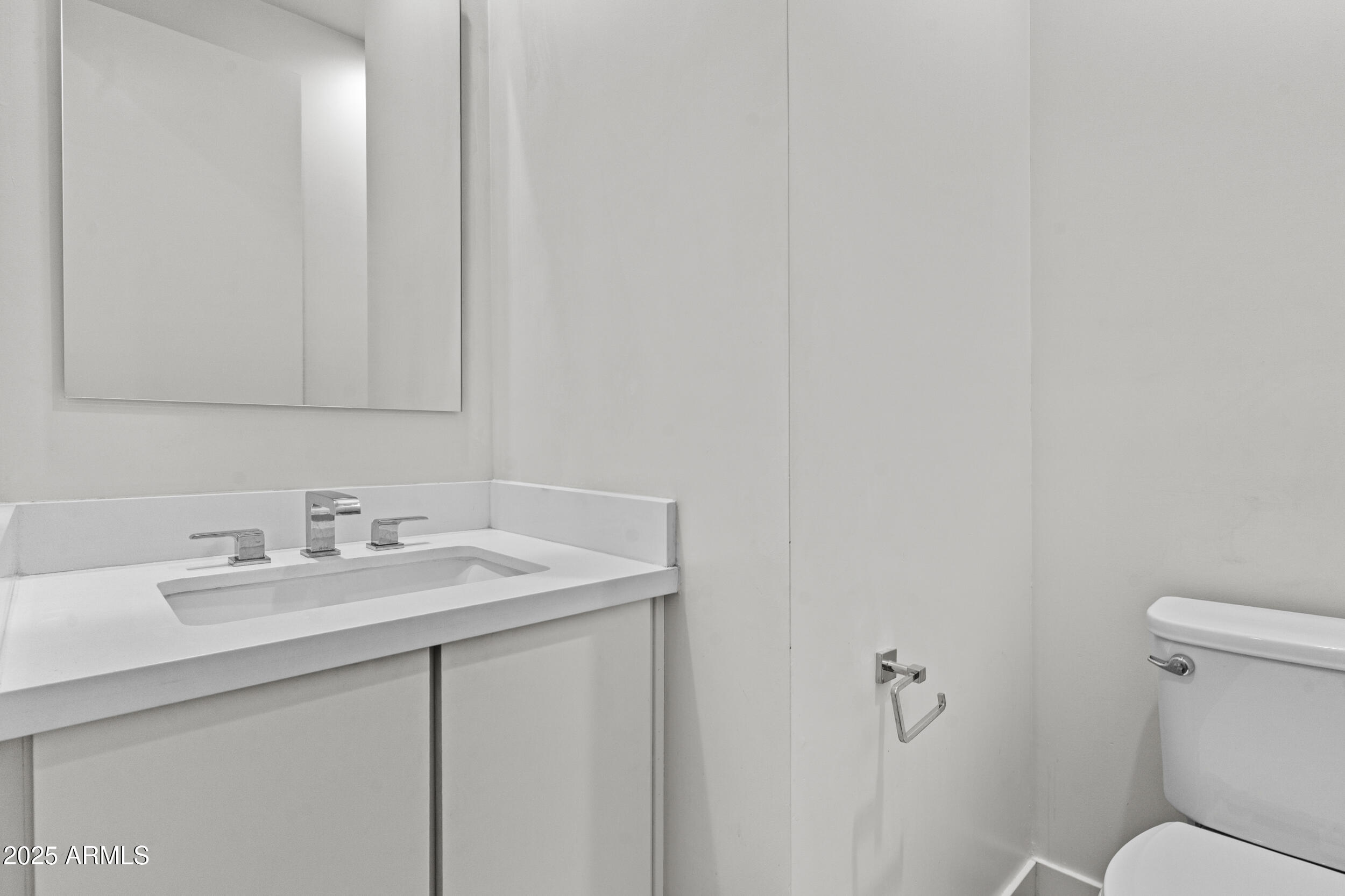 325 East Coronado Road, Unit 8 Phoenix, AZ 85004 - Photo 18 of 34 a bathroom with a sink and a toilet