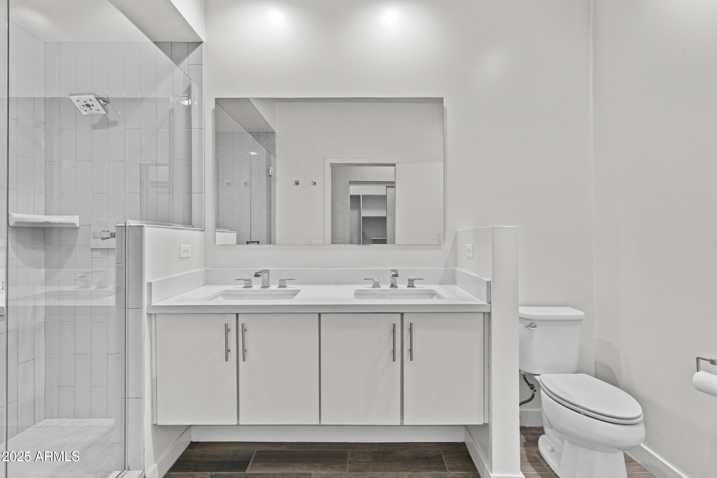 325 East Coronado Road, Unit 8 Phoenix, AZ 85004 - Photo 22 of 34 a bathroom with a sink a toilet and a mirror