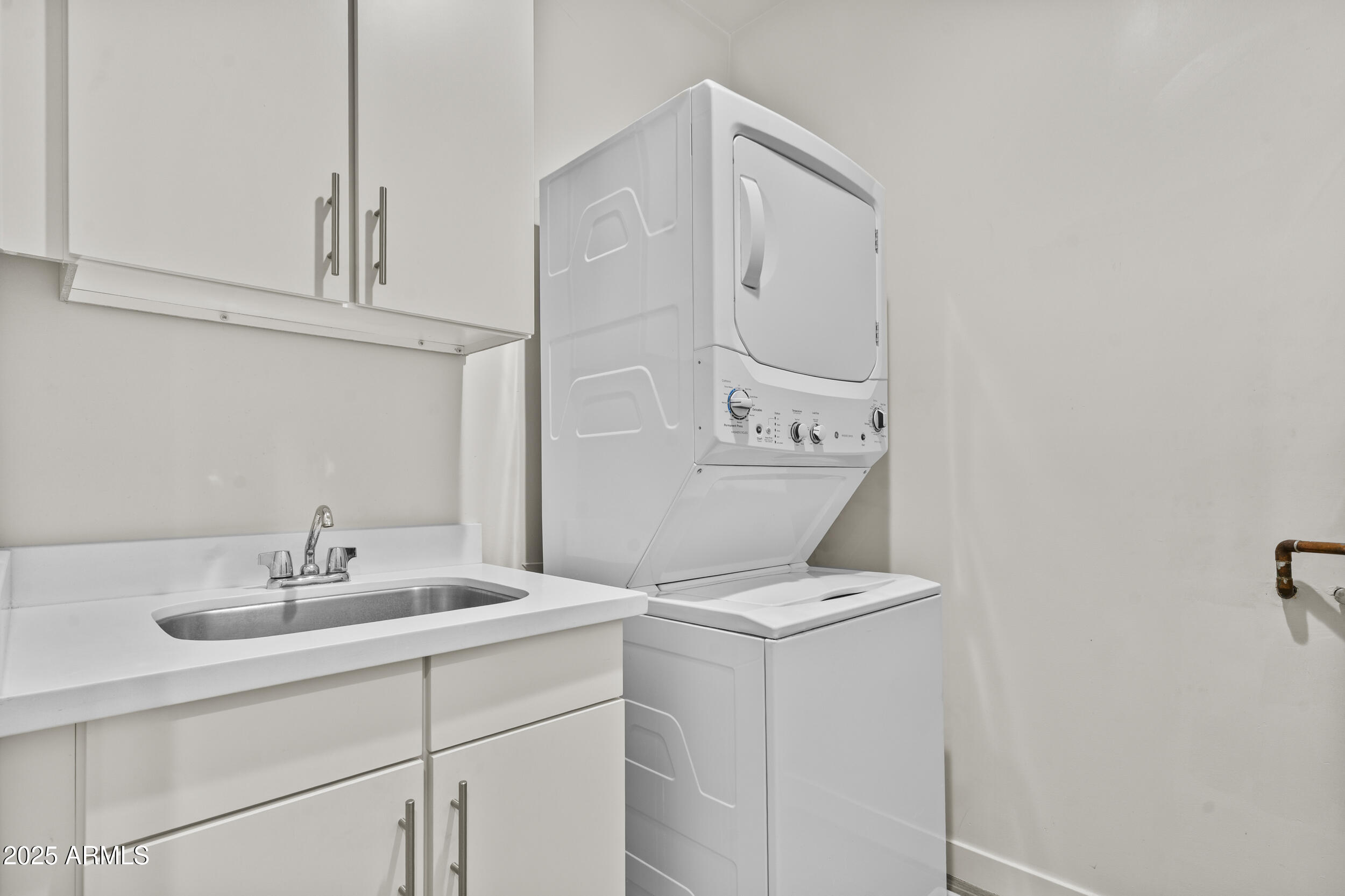 325 East Coronado Road, Unit 8 Phoenix, AZ 85004 - Photo 24 of 34 a bathroom with a sink and a mirror