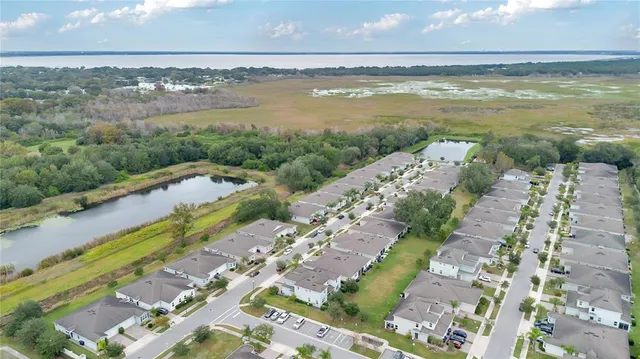 a view of an ocean and city