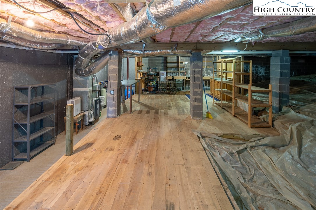 517 Willow Trail Boone, NC 28607 - Photo 18 of 26 a view of a living room with wooden floor