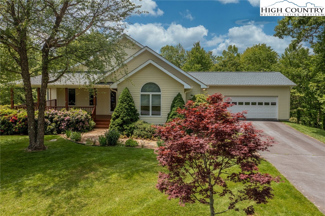 517 Willow Trail Boone, NC 28607 - Photo 20 of 26 a front view of a house with garden
