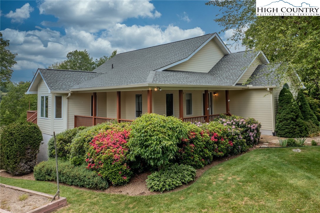 517 Willow Trail Boone, NC 28607 - Photo 23 of 26 a front view of house with a garden