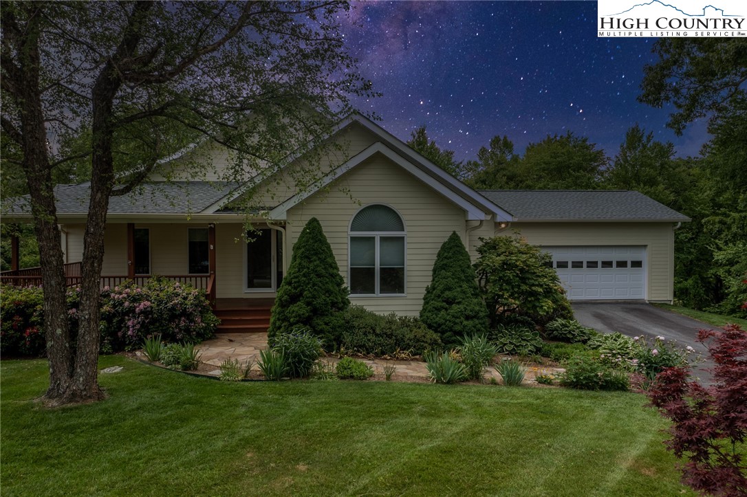 517 Willow Trail Boone, NC 28607 - Photo 26 of 26 a front view of house with a garden