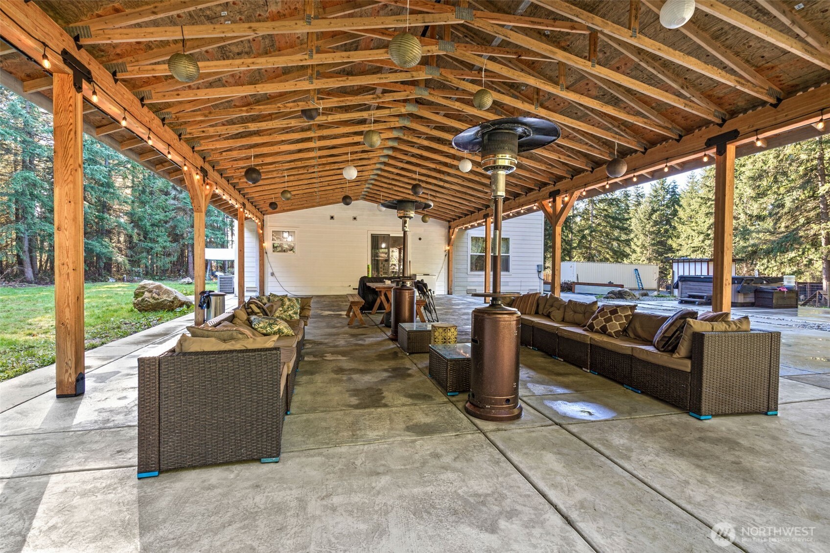 32409 48th Avenue South Roy, WA 98580 - Photo 17 of 23 a living room with patio furniture and a garden