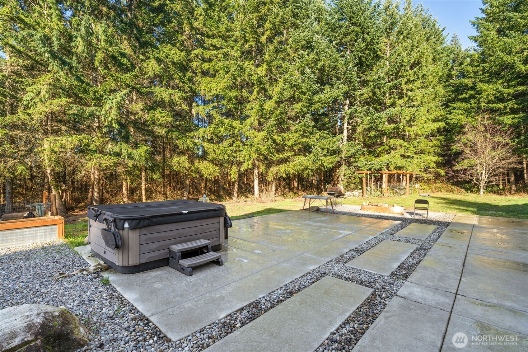 32409 48th Avenue South Roy, WA 98580 - Photo 20 of 23 a backyard of a house with outdoor seating