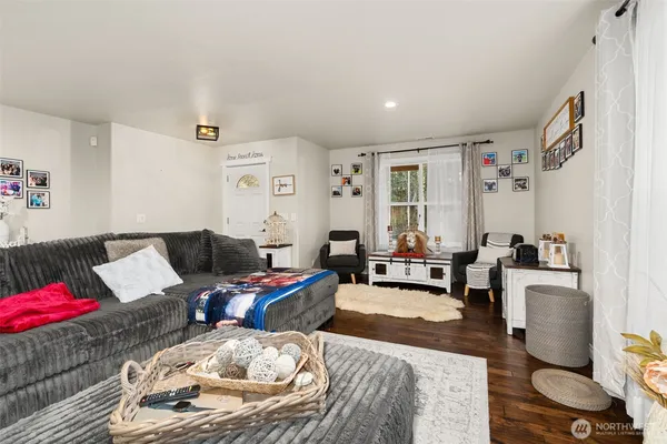 a bed room with furniture and a window