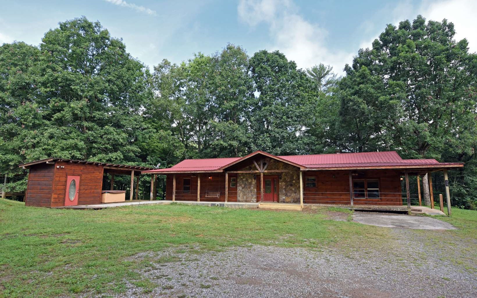 200 Dillard Road Murphy, NC 28906 - Photo 1 of 4 a front view of a house with a garden