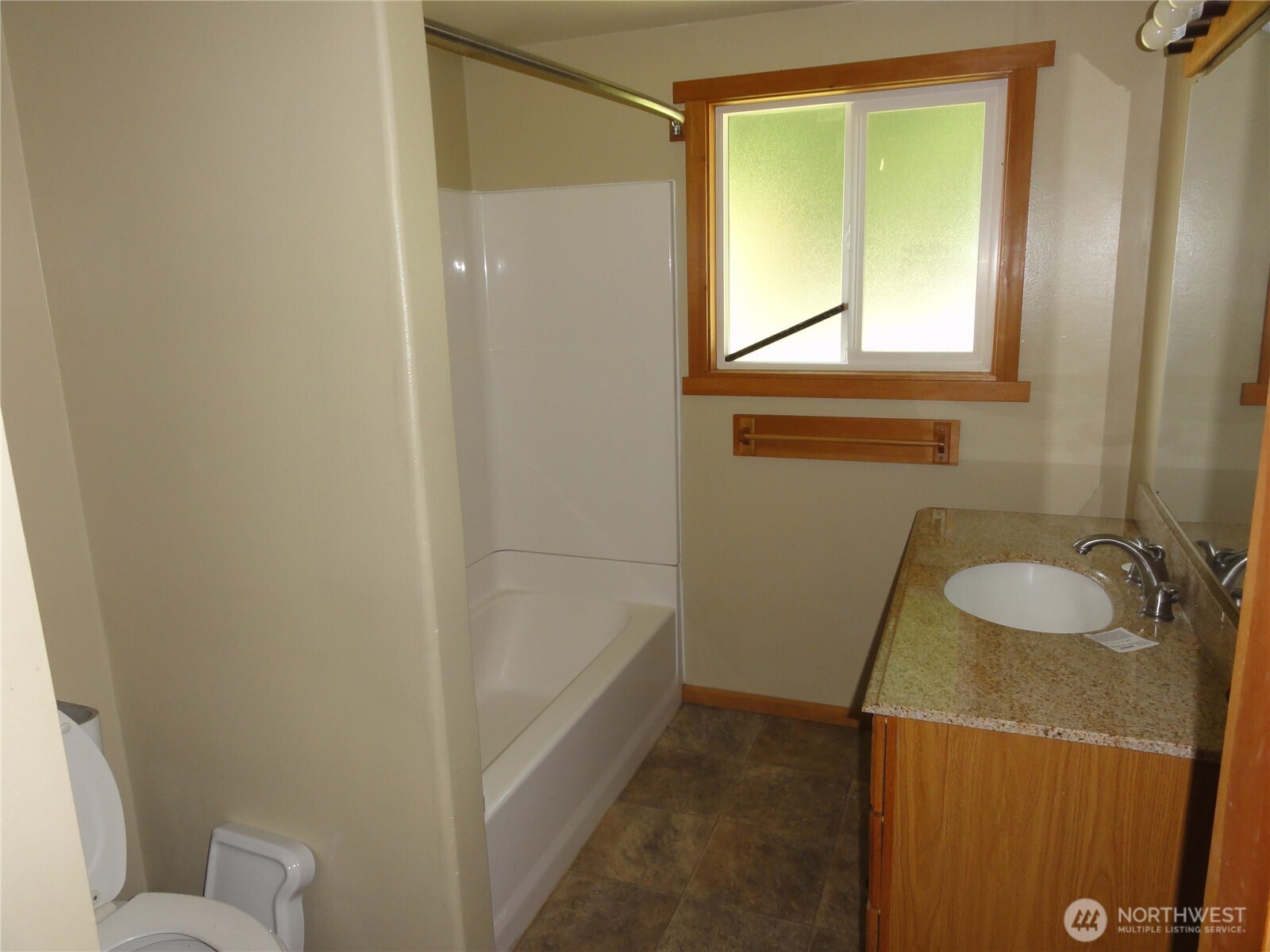 28821 18th Avenue South Federal Way, WA 98003 - Photo 9 of 14 a bathroom with a sink and a mirror