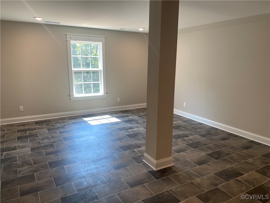 2263 Osborne Rdg Road Rockville, VA 23146 - Photo 20 of 22 an empty room with wooden floor and windows