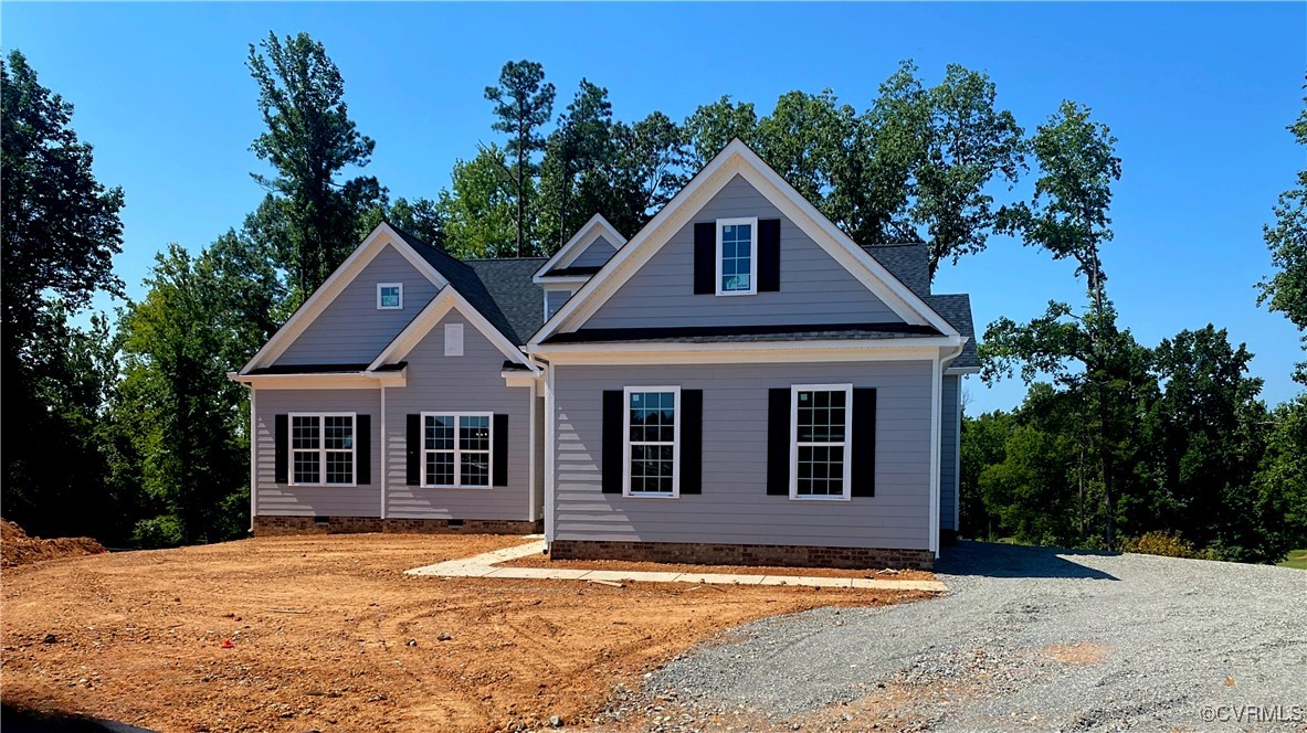 2263 Osborne Rdg Road Rockville, VA 23146 - Photo 2 of 22 a view of a yard in front of a house with large trees