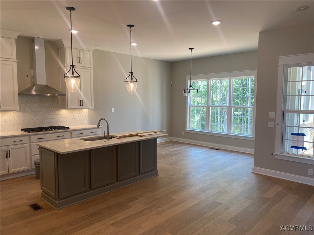 2263 Osborne Rdg Road Rockville, VA 23146 - Photo 9 of 22 a kitchen with wooden floor and window