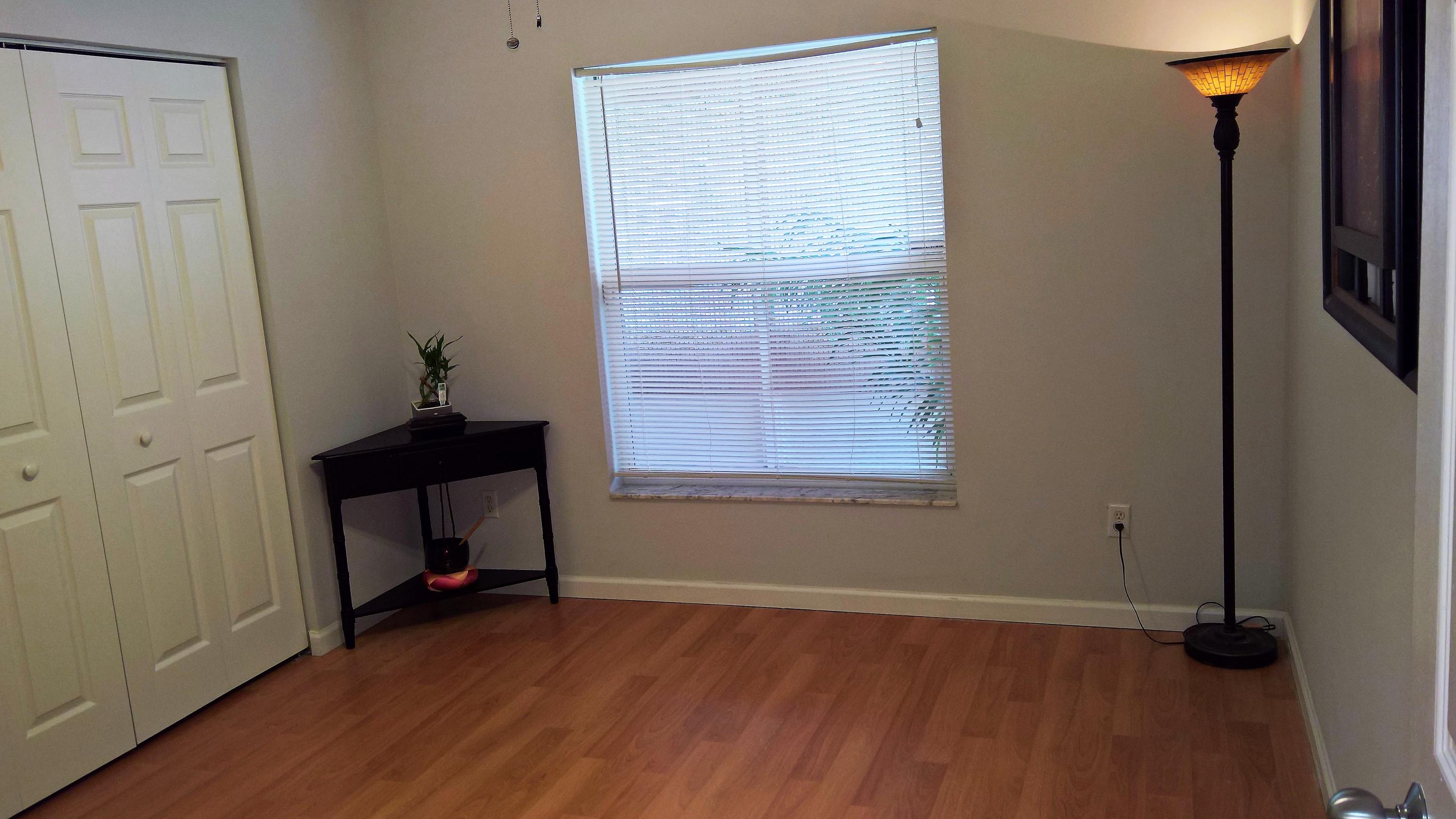 15035 Jackson Road Delray Beach, FL 33484 - Photo 8 of 17 a view of room with window and wooden floor