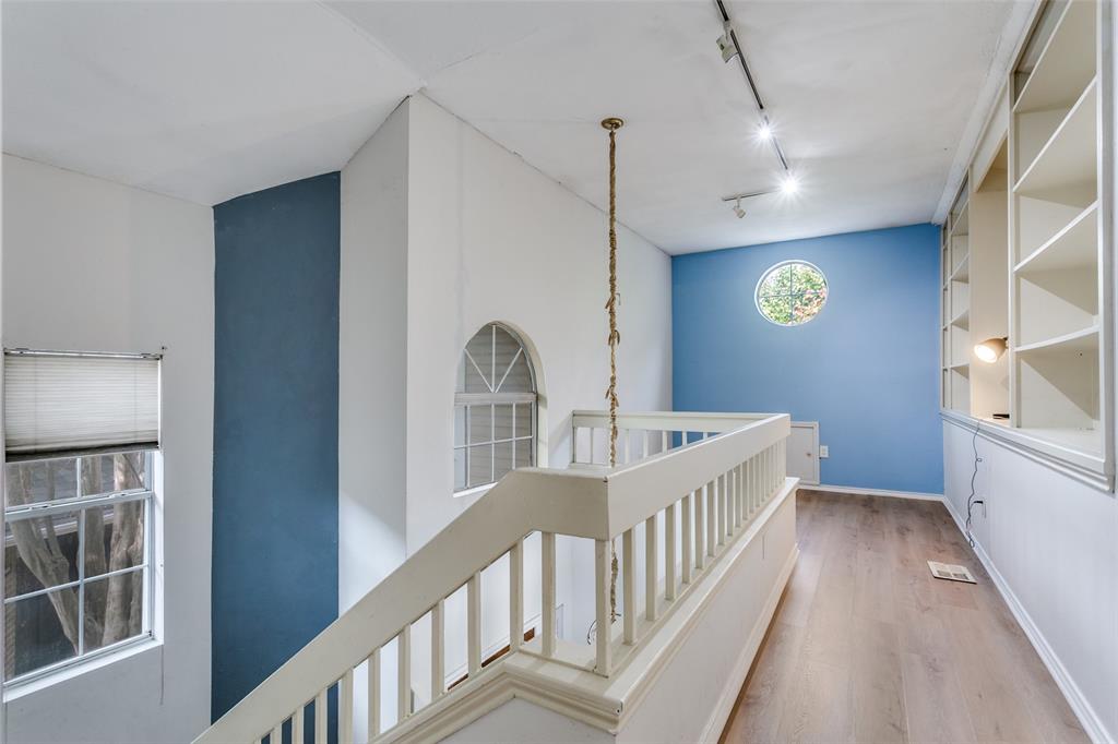 9416 Penny Lane Irving, TX 75063 - Photo 16 of 21 a view of an entryway with wooden floor
