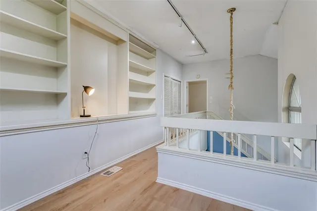 a view of a living room and entryway