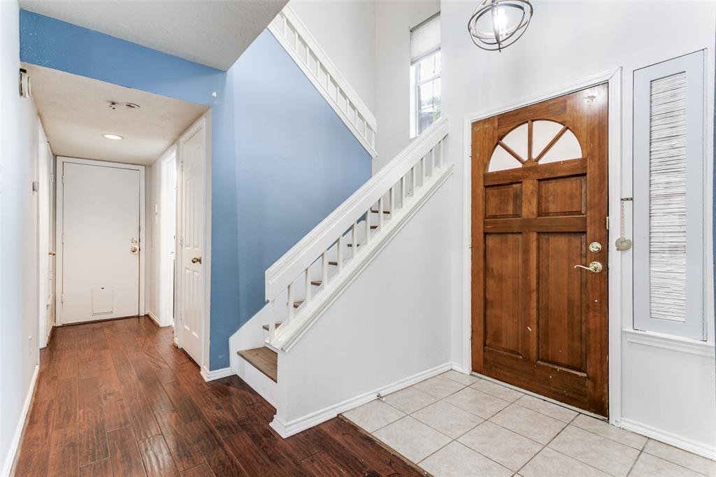 9416 Penny Lane Irving, TX 75063 - Photo 3 of 21 a view of an entryway with wooden floor