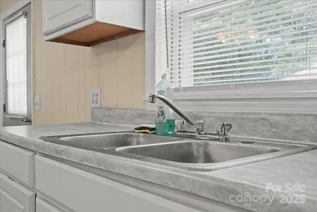 a close view of sink and a faucet