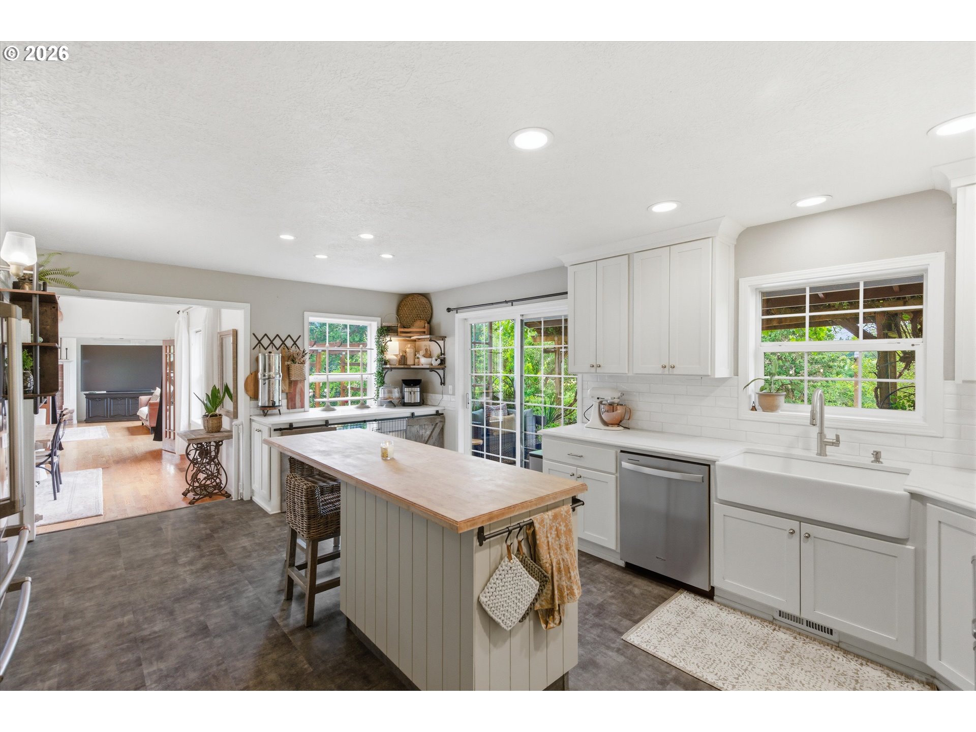13880 McCaleb Road Monmouth, OR 97361 - Photo 11 of 44 a kitchen with a sink stove and cabinets