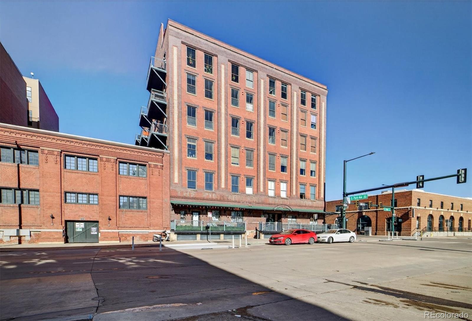 2261 Blake Street, Unit 4F Denver, CO 80205 - Photo 34 of 38 front view of a building with a street