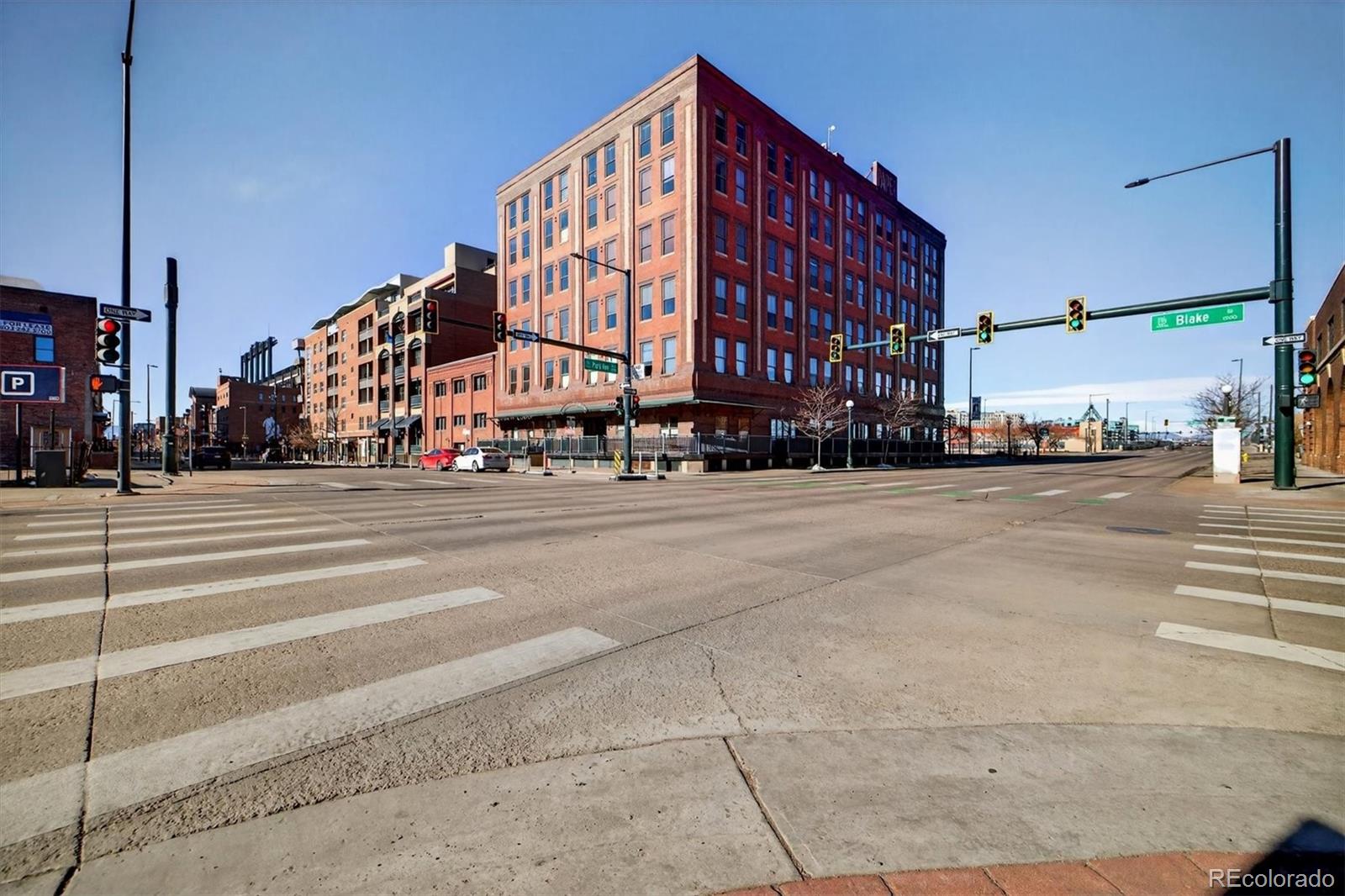2261 Blake Street, Unit 4F Denver, CO 80205 - Photo 36 of 38 a view of a building and a street