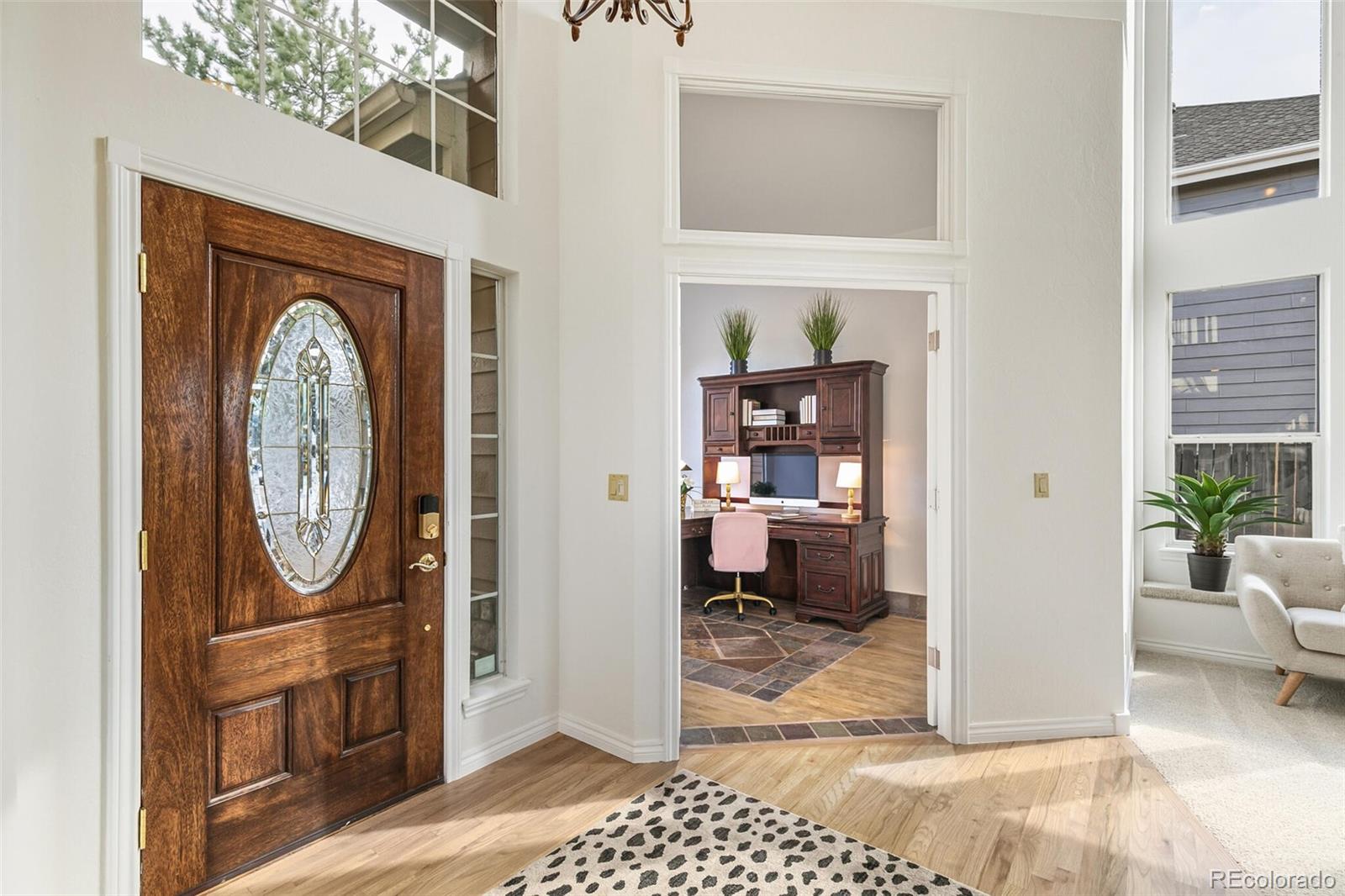 10275 Baneberry Place Highlands Ranch, CO 80129 - Photo 15 of 50 a view of a storage & utility room with washer and dryer