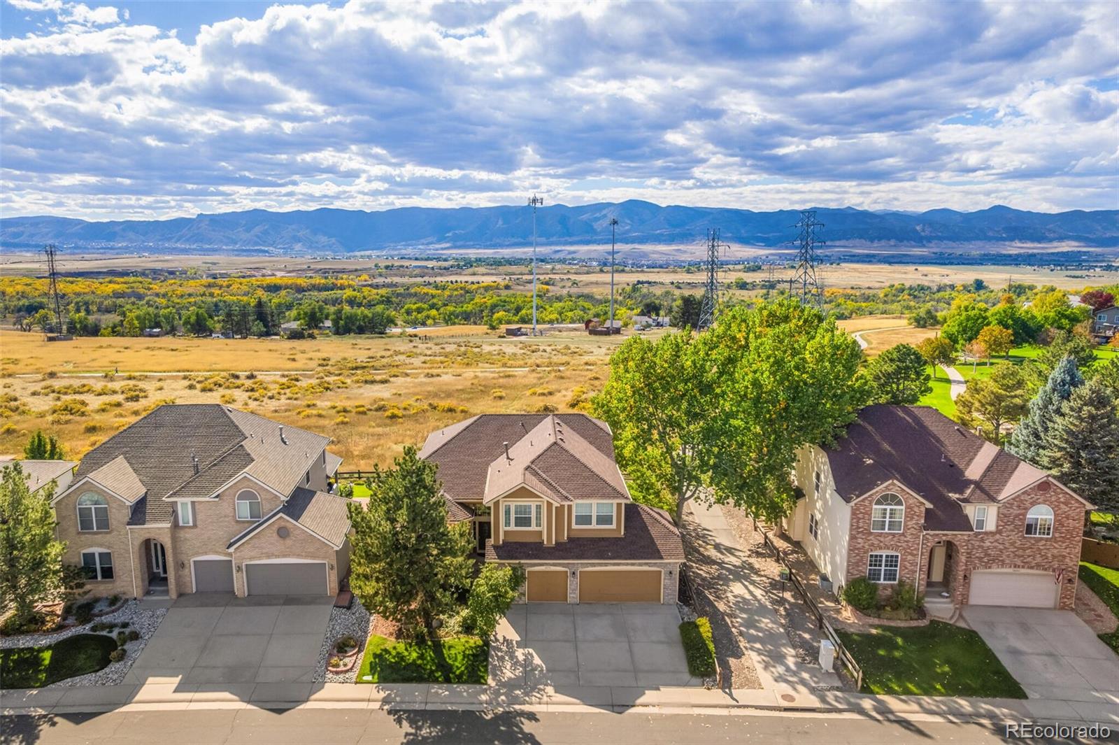 10275 Baneberry Place Highlands Ranch, CO 80129 - Photo 2 of 50 a view of a city with an ocean beach