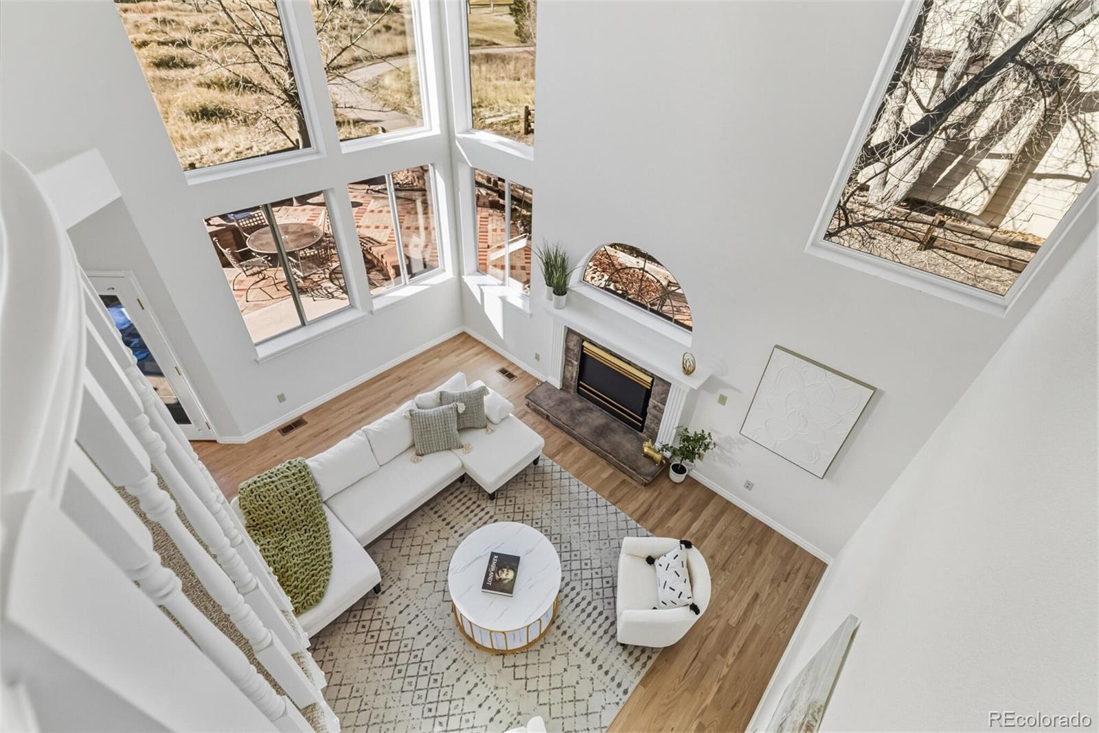 10275 Baneberry Place Highlands Ranch, CO 80129 - Photo 22 of 50 a view of living room with furniture and a window