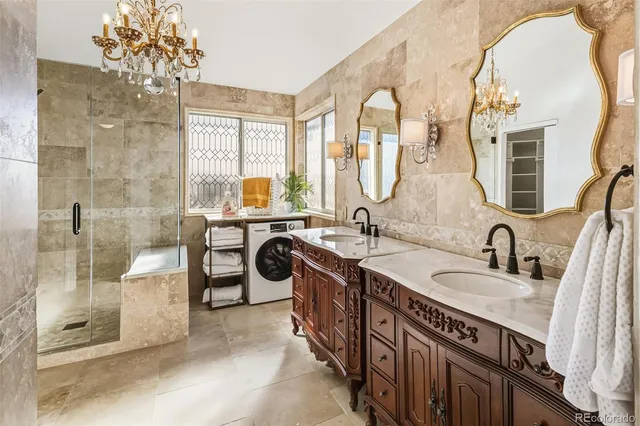 a bathroom with a sink double vanity and a mirror