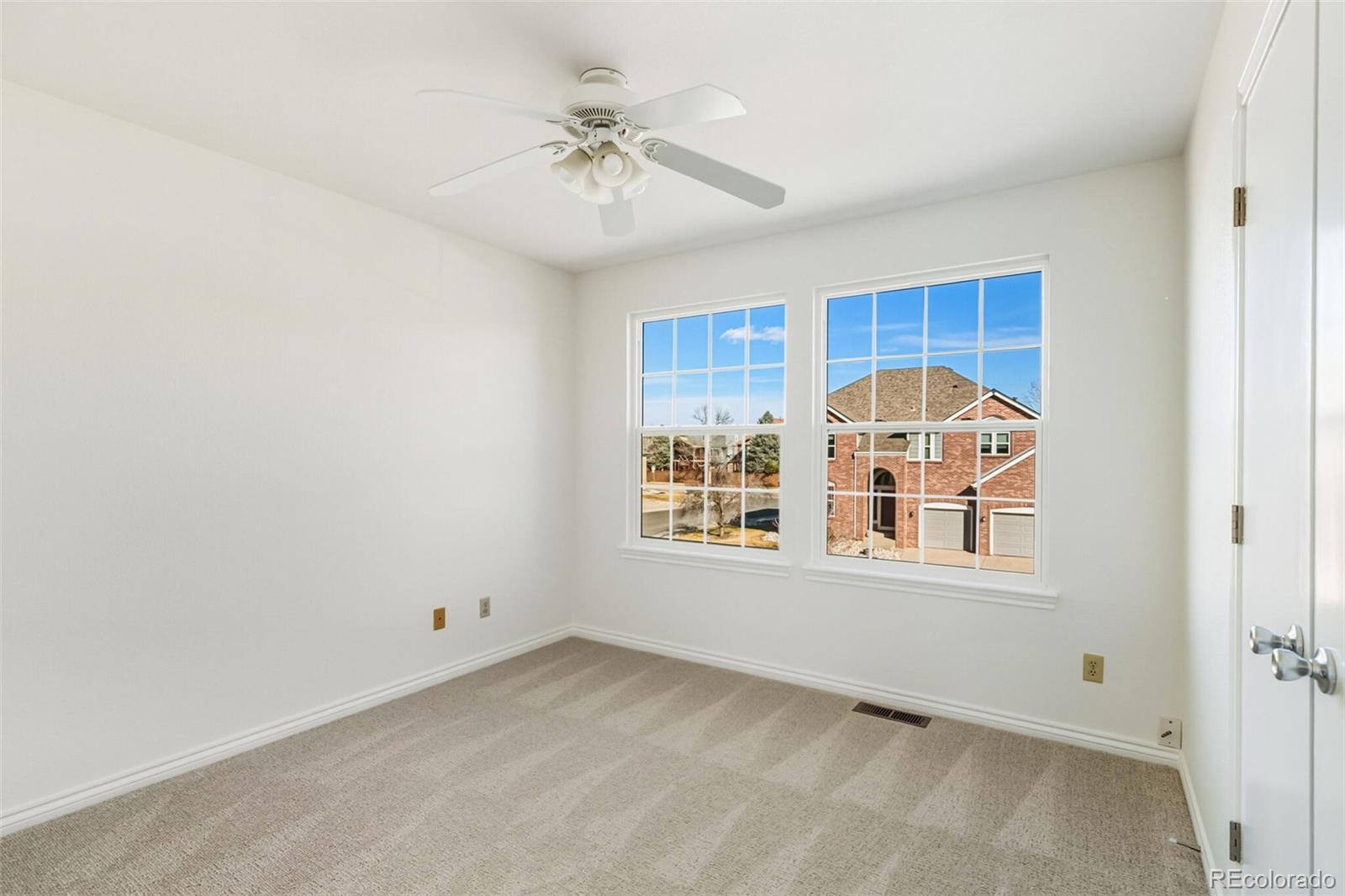 10275 Baneberry Place Highlands Ranch, CO 80129 - Photo 30 of 50 a view of an empty room with a window