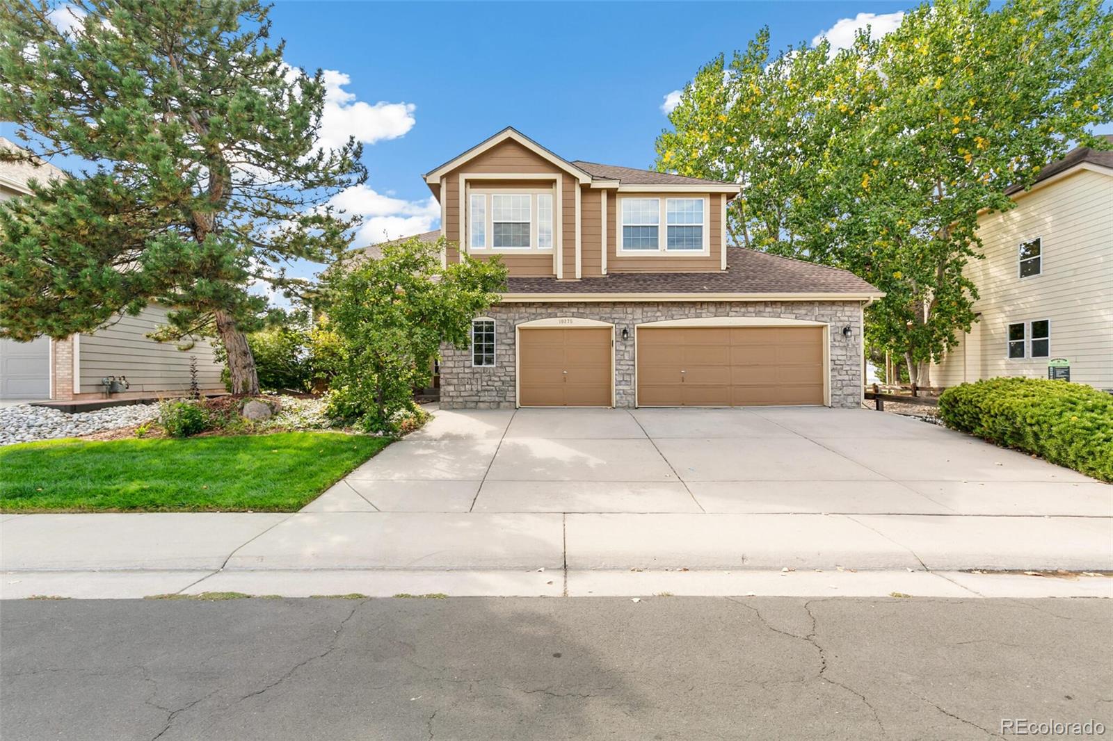 10275 Baneberry Place Highlands Ranch, CO 80129 - Photo 47 of 50 a house view with a outdoor space