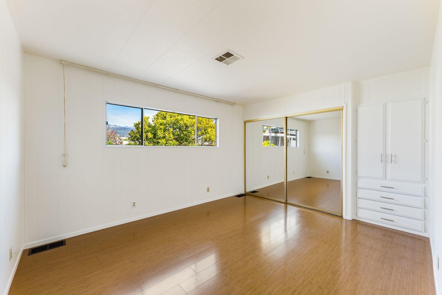 6180 Via Real, Unit 118 Carpinteria, CA 93013 - Photo 18 of 37 a view of empty room with wooden floor