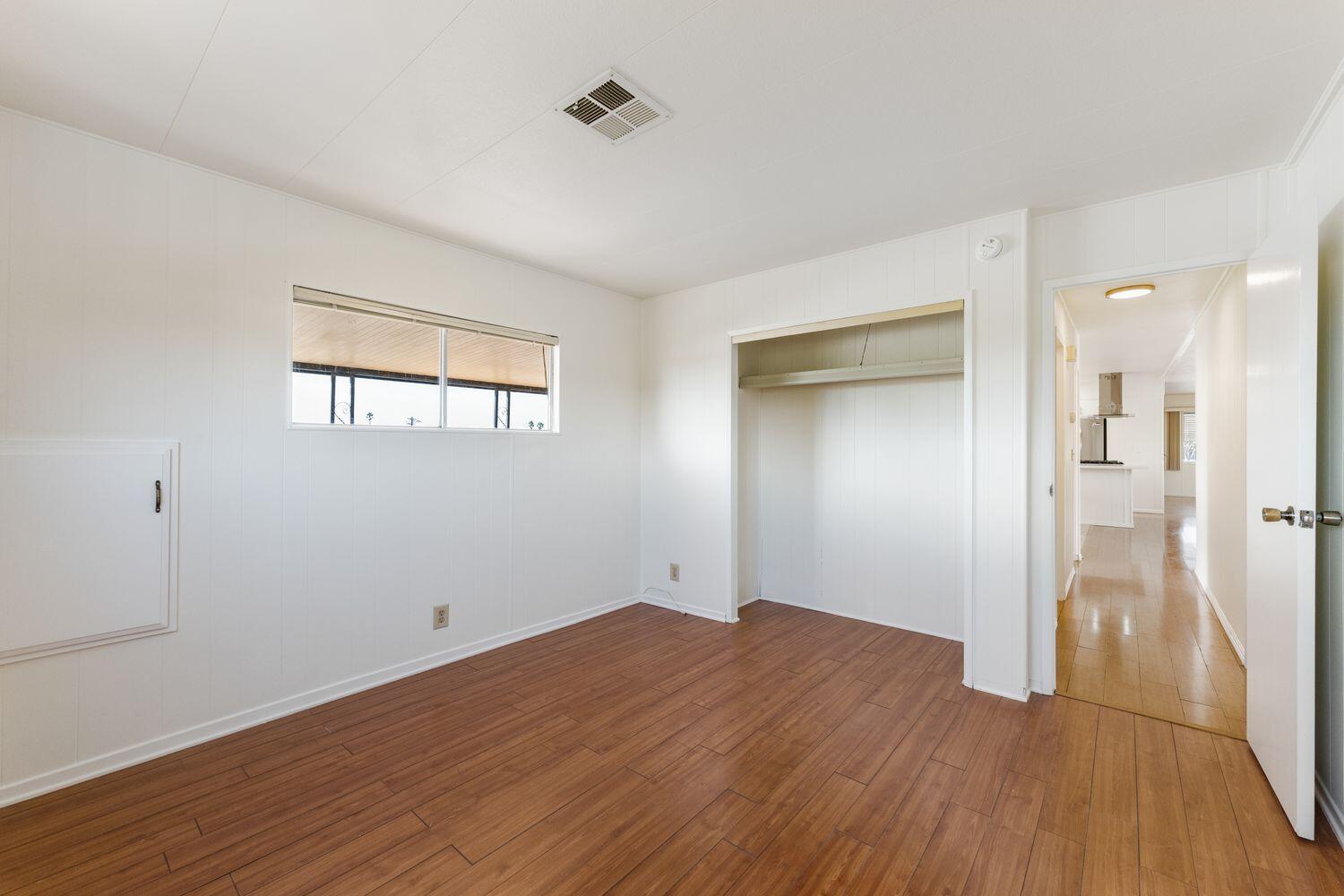 6180 Via Real, Unit 118 Carpinteria, CA 93013 - Photo 24 of 37 a view of a room with wooden floor and a bathroom