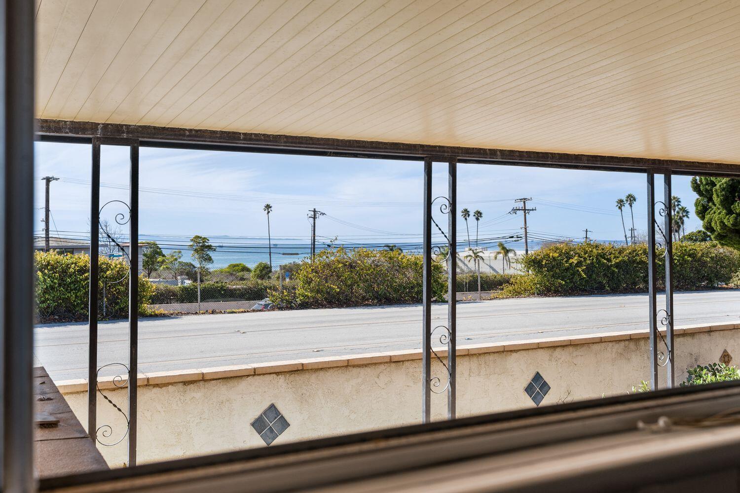 6180 Via Real, Unit 118 Carpinteria, CA 93013 - Photo 28 of 37 a view of a living room and floor to ceiling window