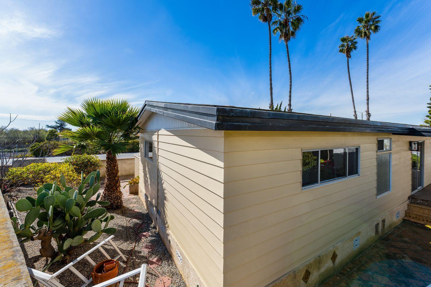 6180 Via Real, Unit 118 Carpinteria, CA 93013 - Photo 30 of 37 a view of a house with a backyard