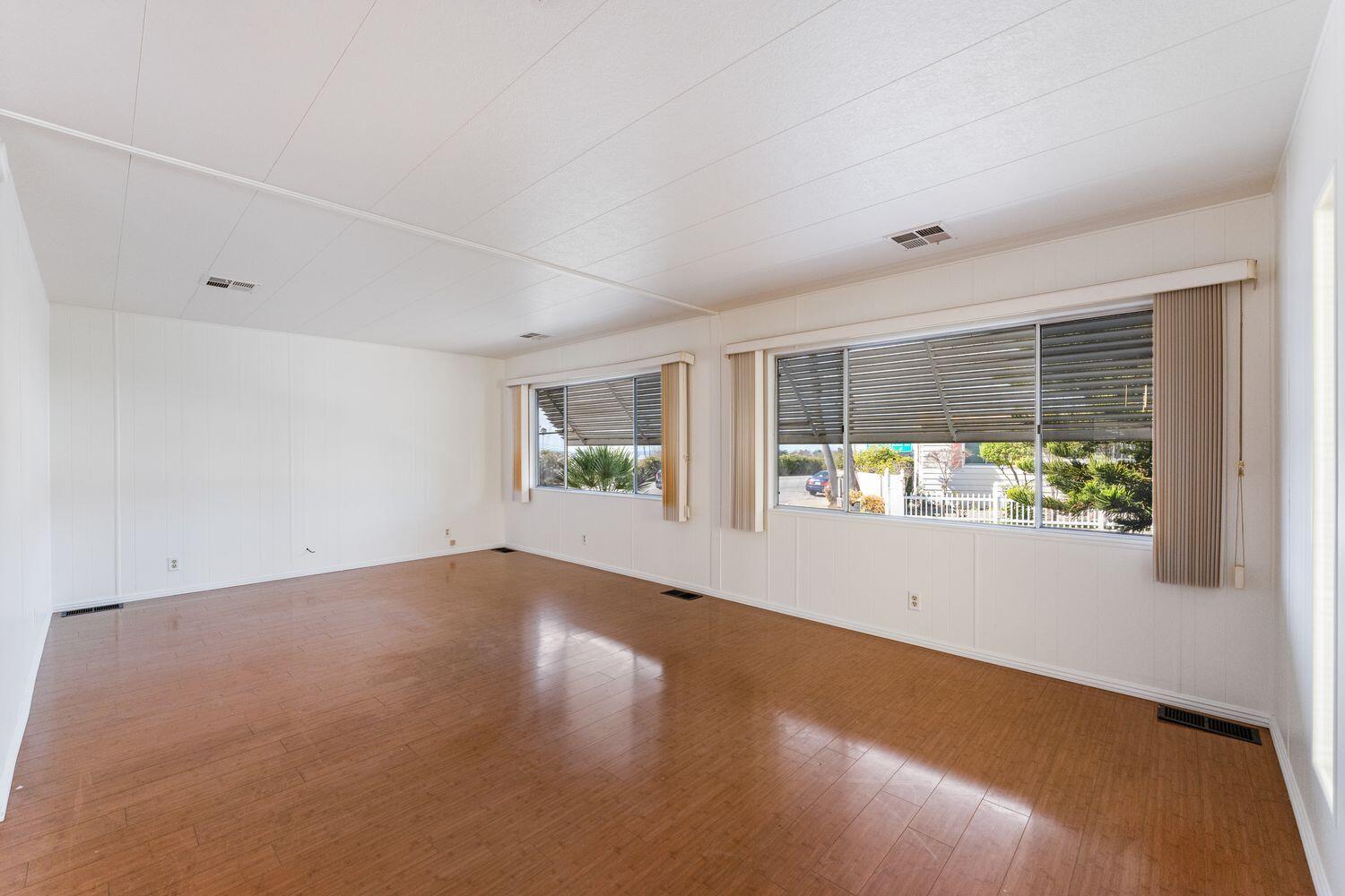 6180 Via Real, Unit 118 Carpinteria, CA 93013 - Photo 4 of 37 an empty room with windows