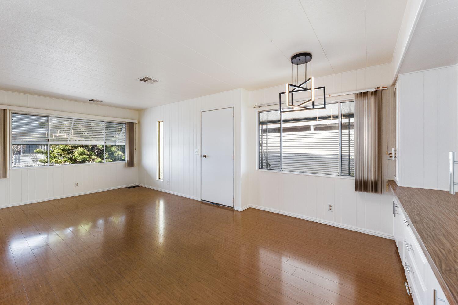 6180 Via Real, Unit 118 Carpinteria, CA 93013 - Photo 5 of 37 a view of empty room with wooden floor