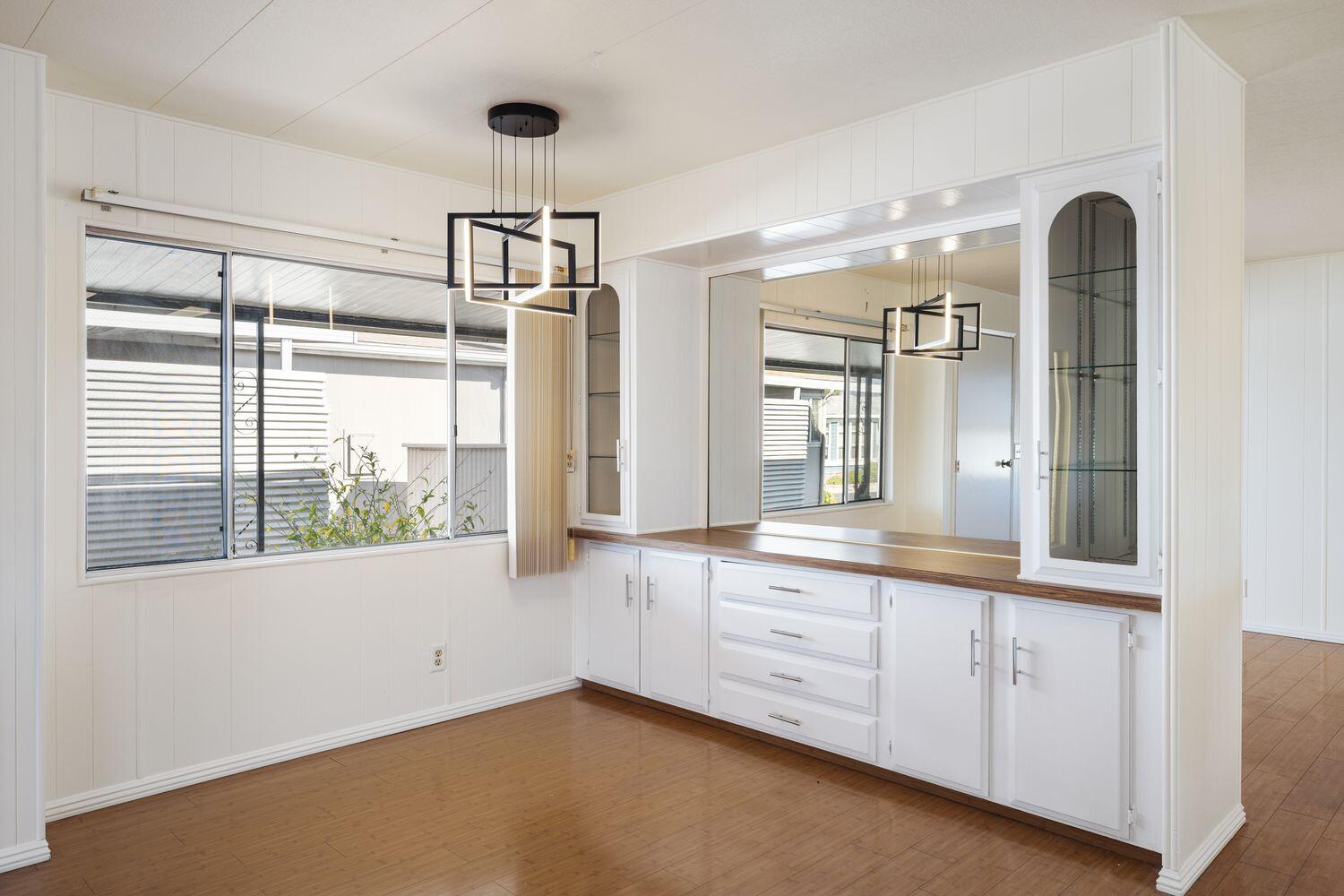 6180 Via Real, Unit 118 Carpinteria, CA 93013 - Photo 7 of 37 a bathroom with a granite countertop sink mirror and window