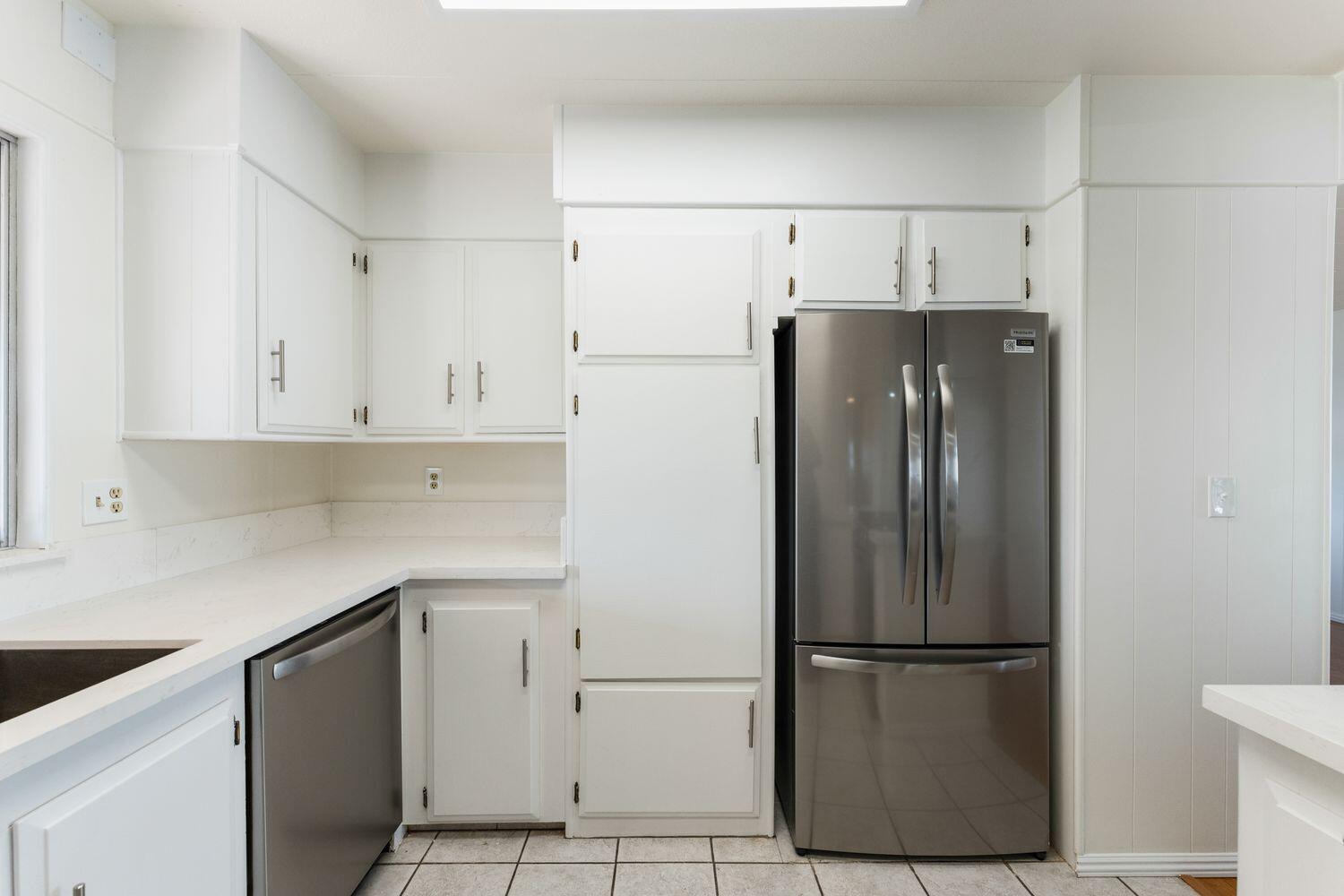 6180 Via Real, Unit 118 Carpinteria, CA 93013 - Photo 10 of 37 a white refrigerator freezer sitting in a kitchen