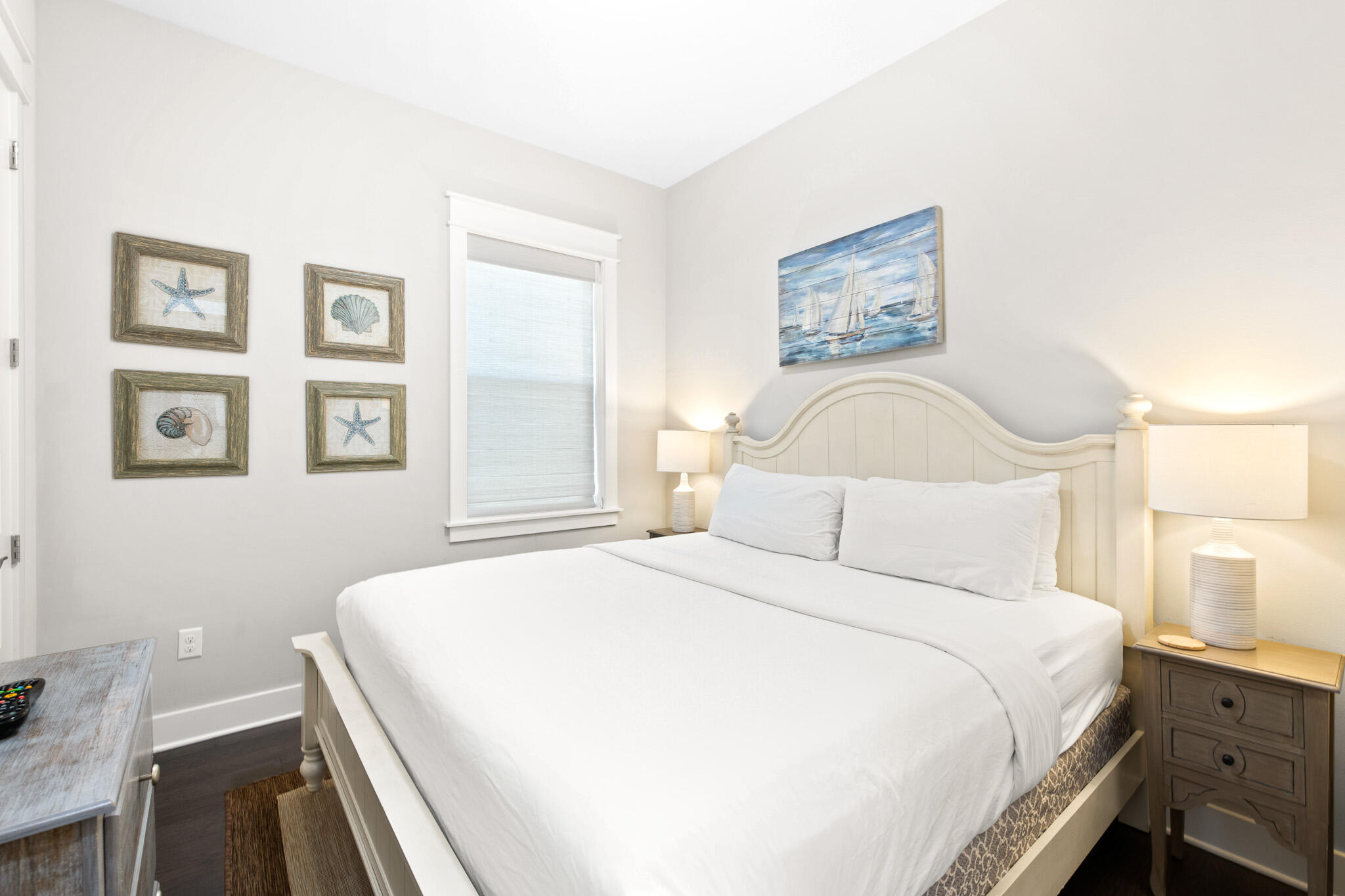 103 Milestone Dr Inlet Beach, Unit A Inlet Beach, FL 32461 - Photo 23 of 49 a bedroom with a bed and painting on the wall