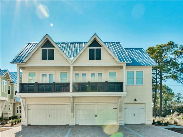 103 Milestone Dr Inlet Beach, Unit A Inlet Beach, FL 32461 - Photo 3 of 49 a front view of a house with windows