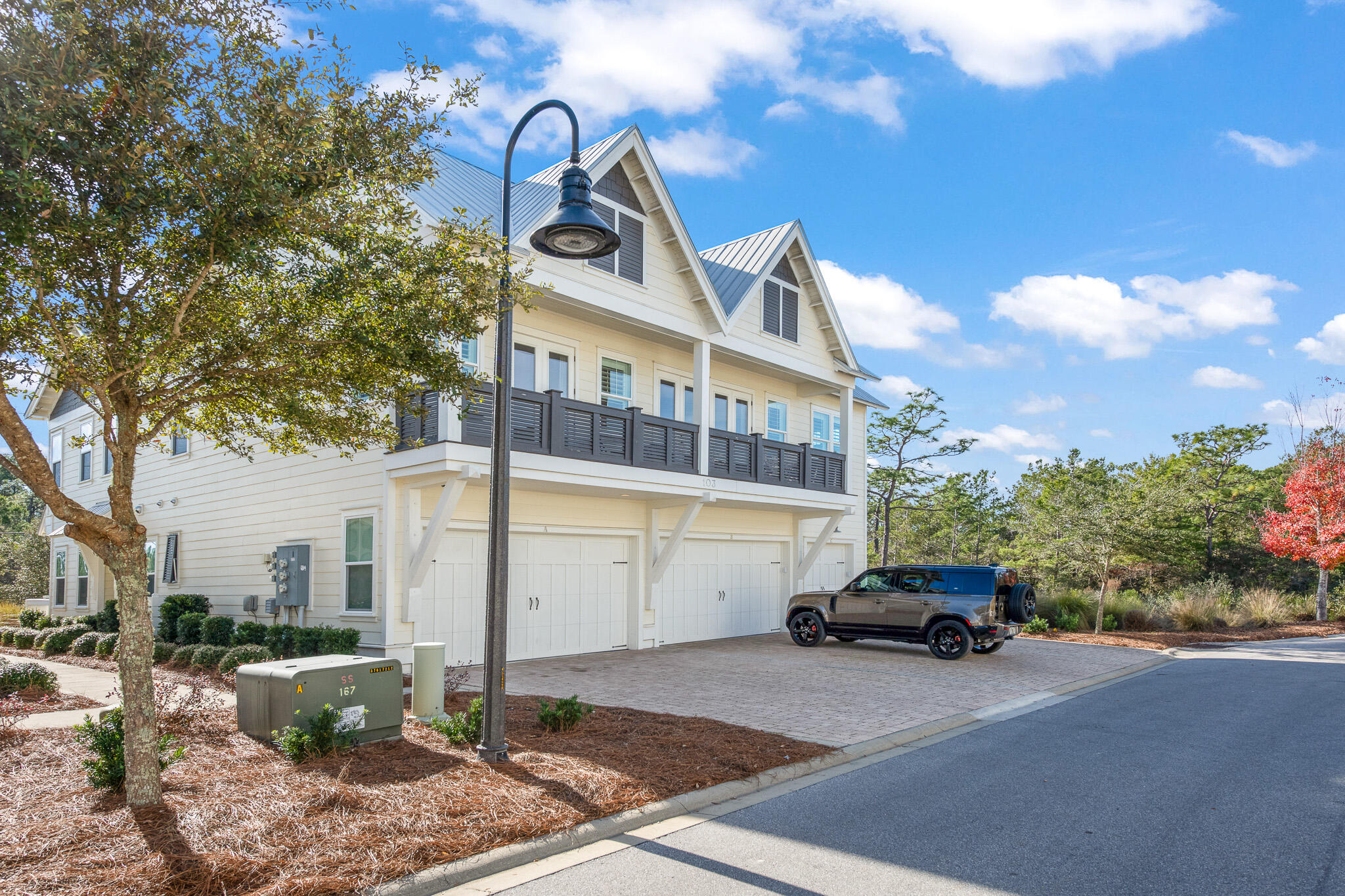 103 Milestone Dr Inlet Beach, Unit A Inlet Beach, FL 32461 - Photo 35 of 49 a front view of a building with parking space