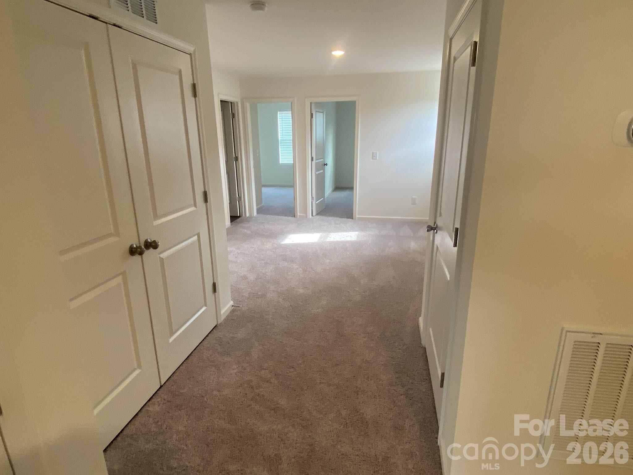 611 Richard Road Lexington, NC 27292 - Photo 5 of 10 an empty room with wooden door