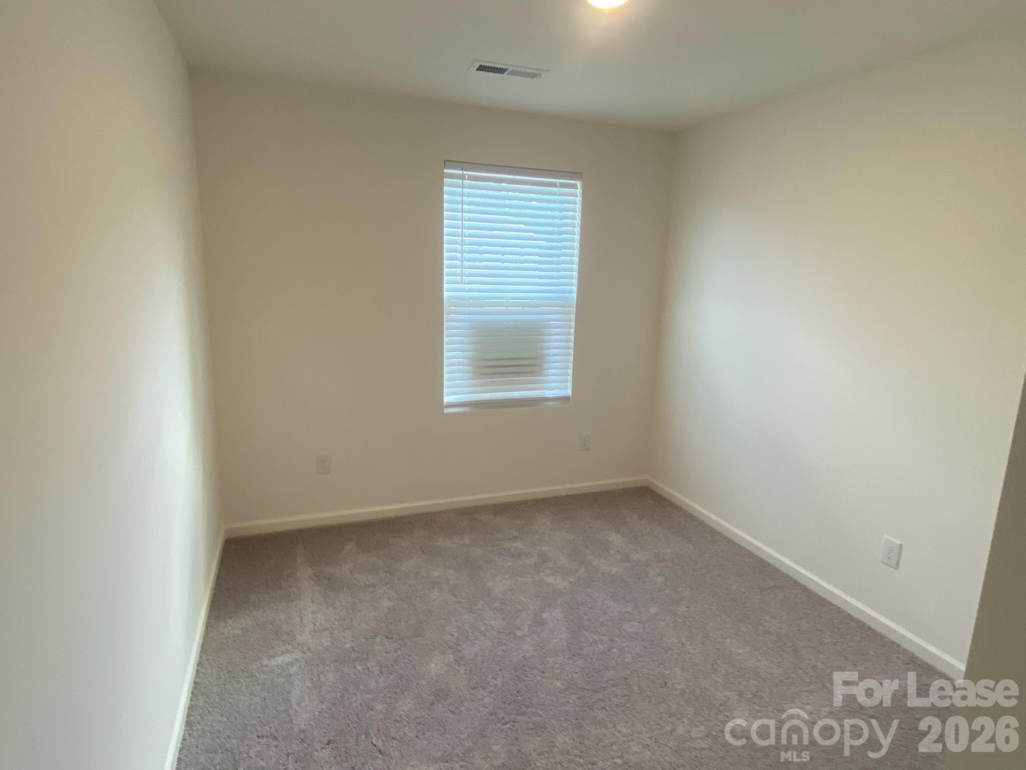 611 Richard Road Lexington, NC 27292 - Photo 7 of 10 an empty room with a window