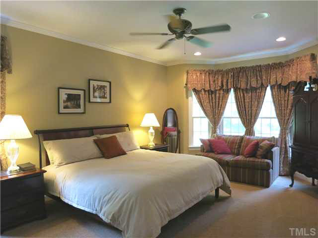 1627 Weatherford Circle Raleigh, NC 27604 - Photo 16 of 25 The spacious 1st flr Master Bedroom features neutral carpet, CF, bay window, big private Bath & lg WIC w/dbl windows. Master Bedroom