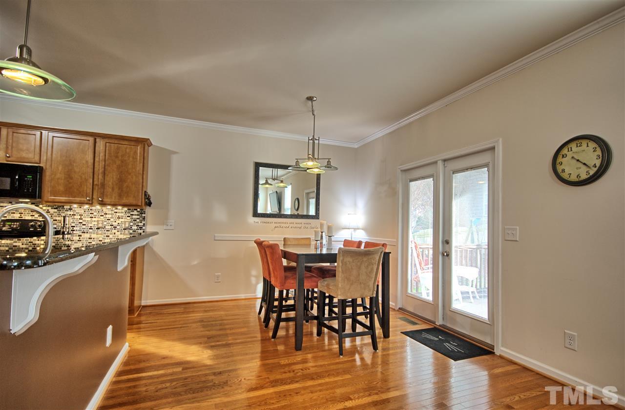 4904 Jelynn Street Raleigh, NC 27616 - Photo 6 of 25 Family Room is open to Dining Area & Kitchen- Great for entertaining and family gatherings.