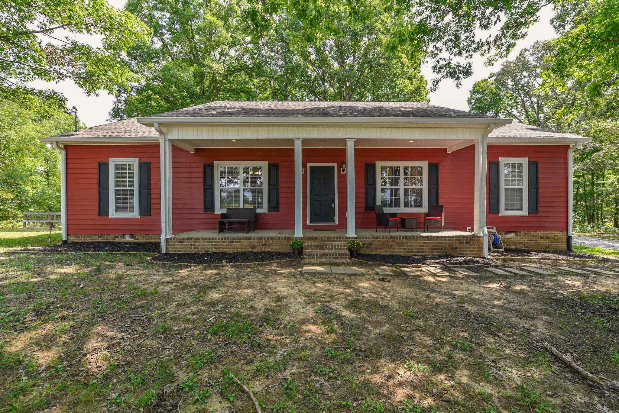 2001 West Tennessee City Road Dickson, TN 37055 - Photo 1 of 24 a front view of a house with garden