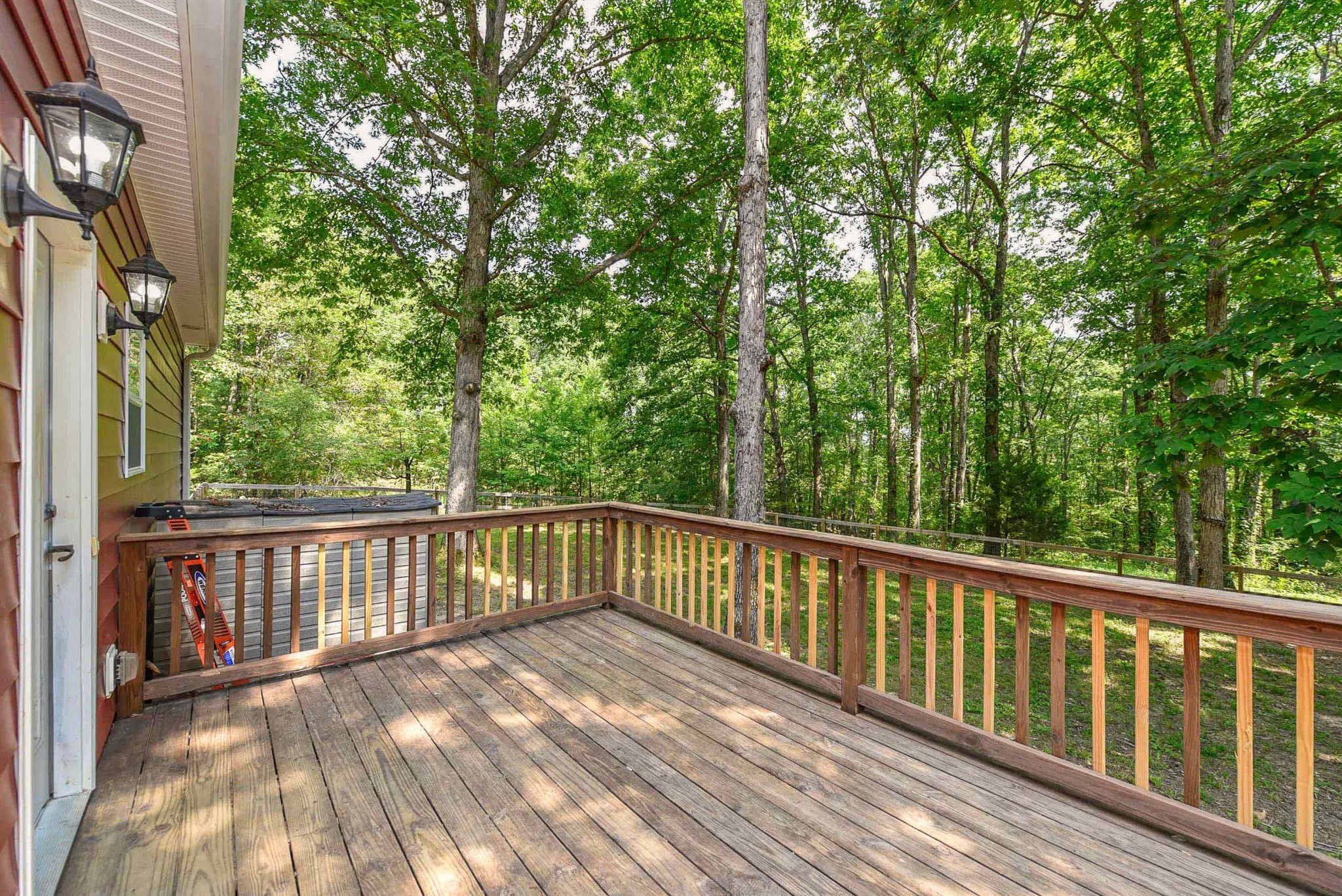 2001 West Tennessee City Road Dickson, TN 37055 - Photo 13 of 24 a view of balcony with deck and trees