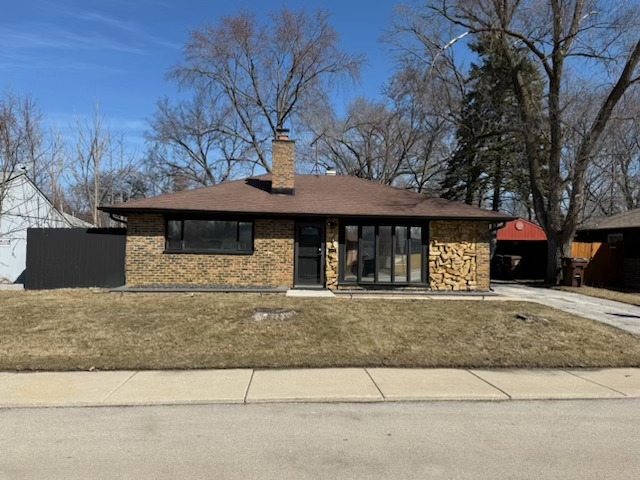 316 Mohawk Street Park Forest, IL 60466 - Photo 1 of 26 front view of house with a yard