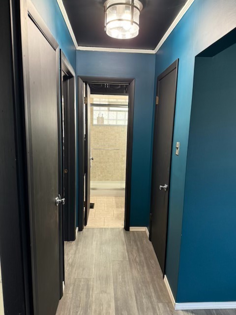316 Mohawk Street Park Forest, IL 60466 - Photo 12 of 26 a view of a hallway with wooden floor