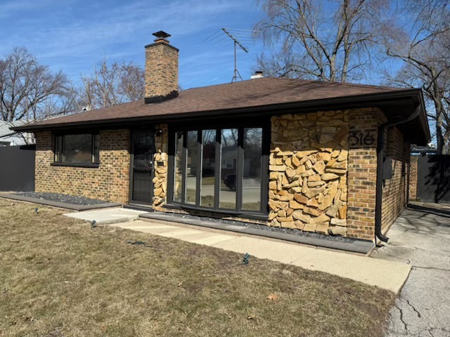 316 Mohawk Street Park Forest, IL 60466 - Photo 2 of 26 a view of a door of the house with a outdoor space